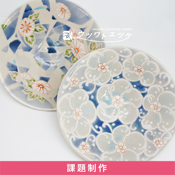和絵具でフラミンゴや文様が描かれた盆皿2枚